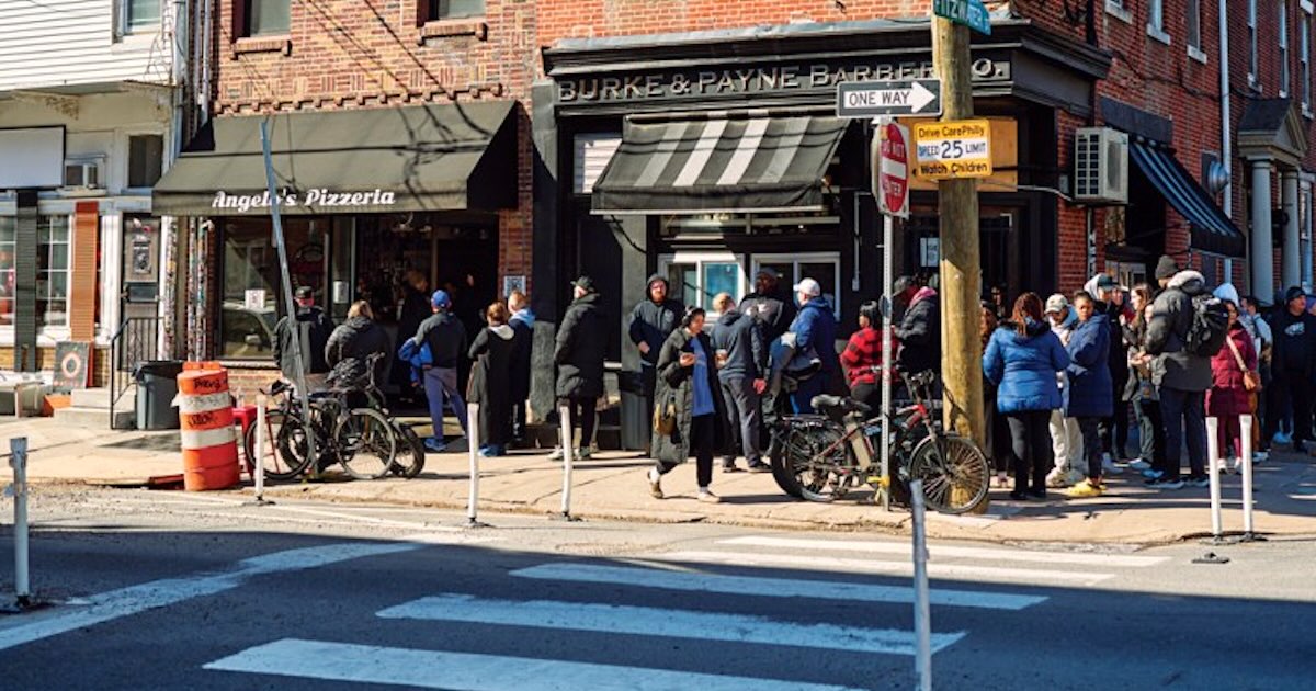 The line outside South Philadelphia's Angelo's Pizzeria, where people wait in line for hours for cheesesteaks